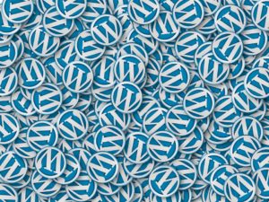 Fondo lleno de botones de color azul cielo con una W blanca, el logo de WordPress